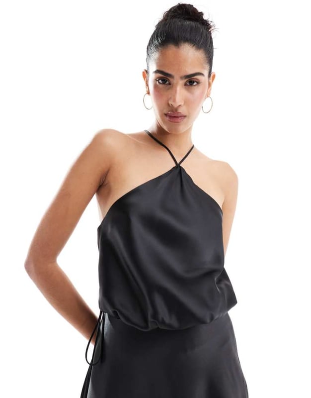 Tops by ASOS DESIGN Part of a co-ord set Skirt sold separately Halterneck style Fixed straps Scoop back Regular fitSold By: Asos