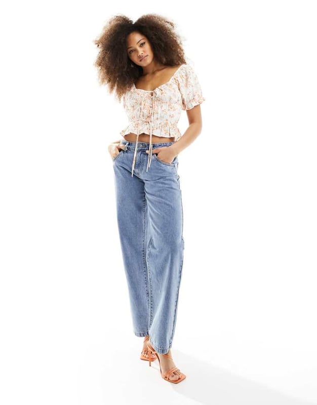 Tops by ASOS DESIGN Introduce it to your other nice tops Sweetheart neck Puff sleeves Button placket Tie front Regular fitSold By: Asos
