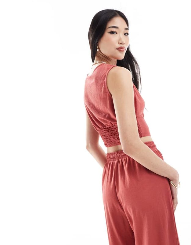 Tops by ONLY Part of a co-ord set Trousers sold separately Plunge neck Sleeveless style Shirred, stretch panel to back Cropped length Regular fitSold By: Asos