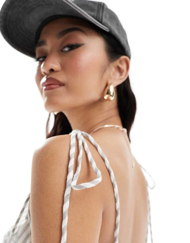 Tops by ASOS DESIGN Can't top this Square neck Tie straps Elasticated underband Open back Cropped length Regular fitSold By: Asos