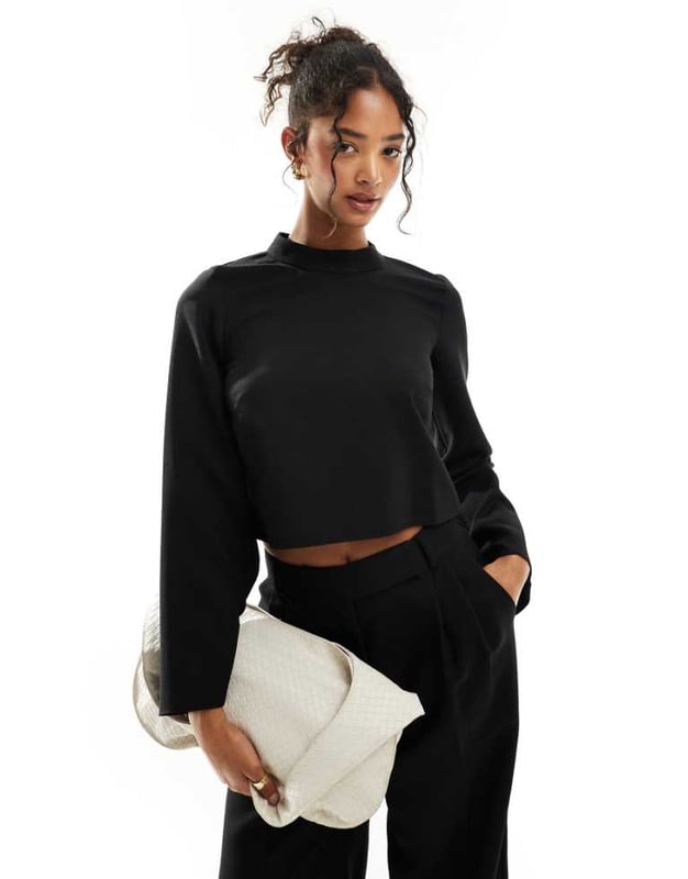 Tops by Closet London Part of a co-ord set Bottoms sold separately High neck Long sleeves Button-keyhole back Cropped length Regular fitSold By: Asos