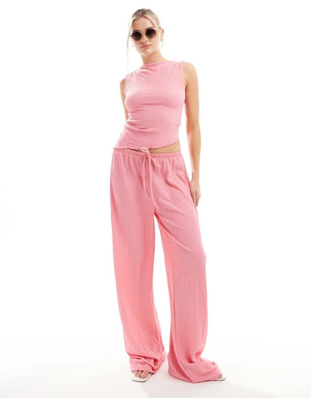 Tops by ASOS DESIGN Part of a co-ord set Trousers sold separately Textured finish Wide neck Sleeveless style Slim fitSold By: Asos