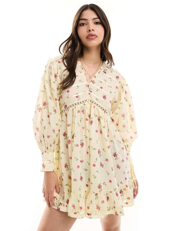 Jumpsuits & Playsuits by ASOS DESIGN Floral design V-neck Button placket Blouson sleeves Lace inserts Regular fitSold By: Asos