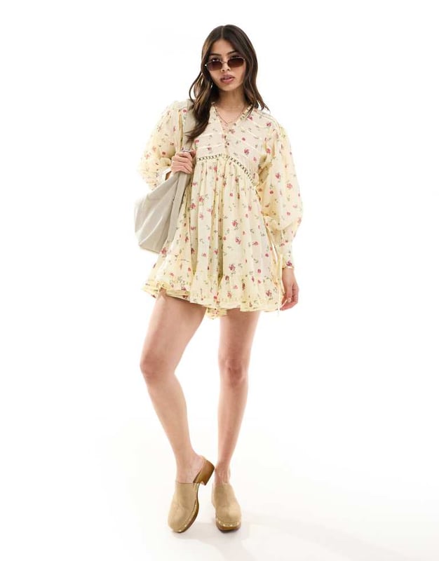 Jumpsuits & Playsuits by ASOS DESIGN Floral design V-neck Button placket Blouson sleeves Lace inserts Regular fitSold By: Asos