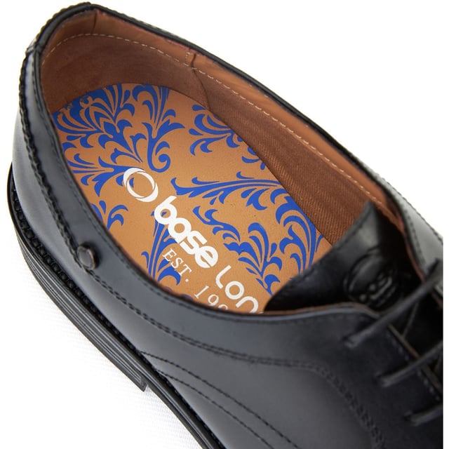 Base London Sleeve Leather Men's Black Lace-Up Shoes Step up your office game with the Sleeve derby shoe. Crafted with sleek leather uppers, a four-lace closure, and Ortholite insole comfort, its slim sole ensures you stay sharp and steady - because confidence starts from the ground up.