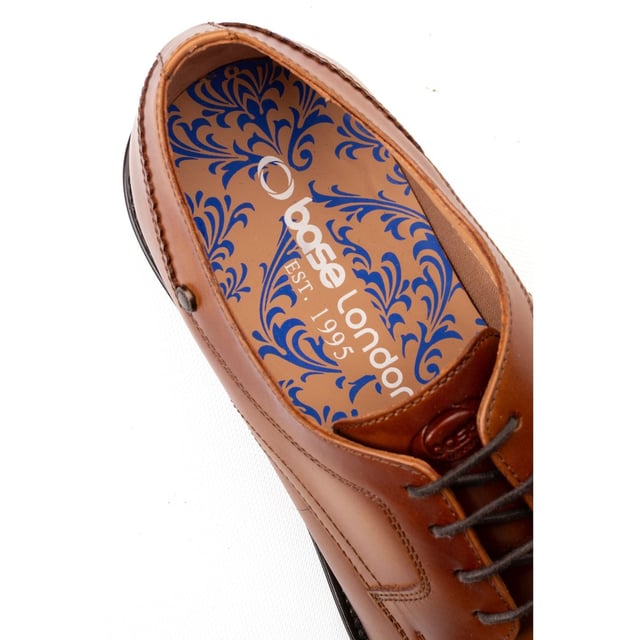 Base London Sleeve Leather Men's Tan Lace-Up Shoes Step up your office game with the Sleeve derby shoe. Crafted with sleek leather uppers, a four-lace closure, and Ortholite insole comfort, its slim sole ensures you stay sharp and steady - because confidence starts from the ground up.