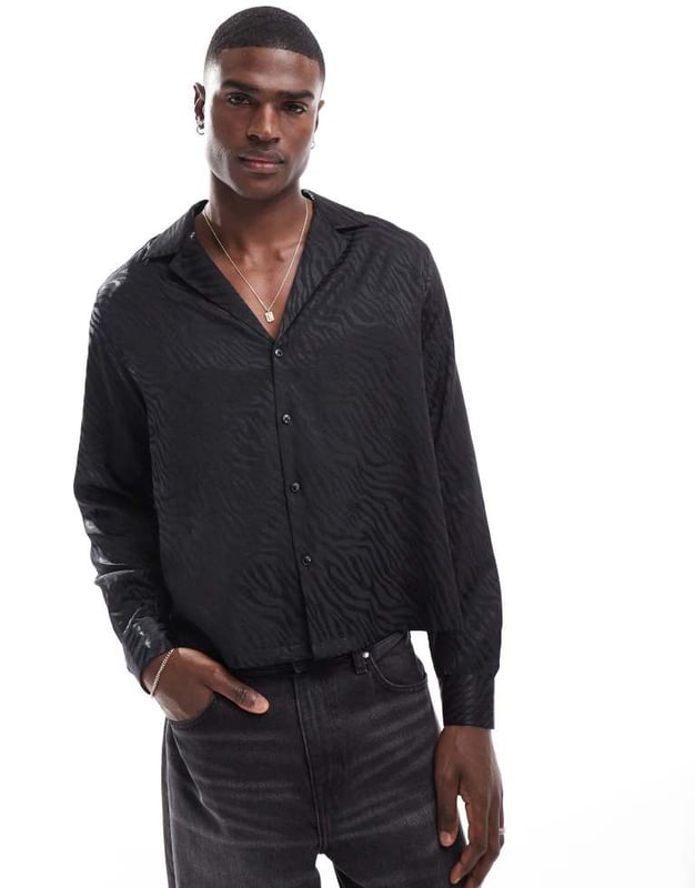 Shirts by ASOS DESIGN May cause compliments Revere collar Button placket Long sleeves Relaxed fitSold By: Asos