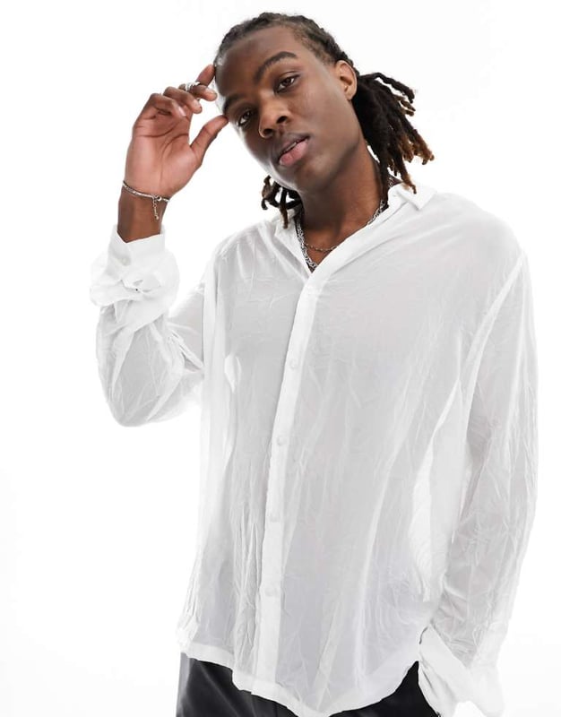 ASOS DESIGN relaxed shirt in crushed texture in white Shirts by ASOS DESIGN Add-to-bag material Spread collar Button placket Buttoned cuffs Relaxed fitSold By: Asos