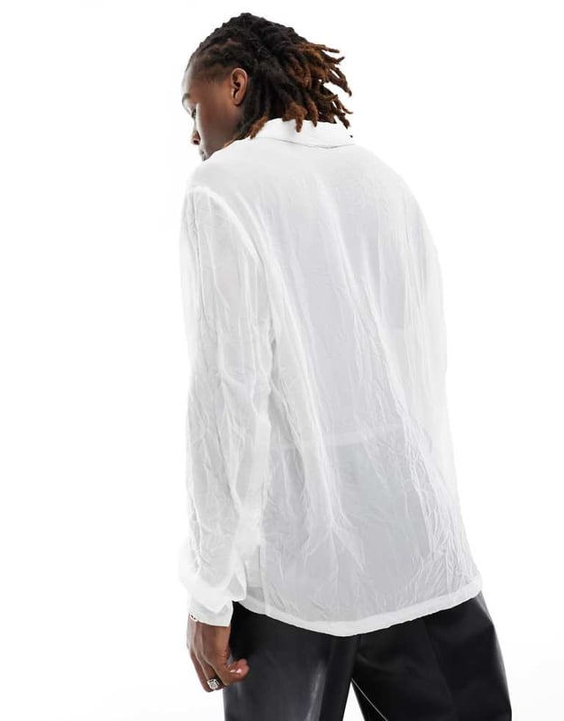 ASOS DESIGN relaxed shirt in crushed texture in white Shirts by ASOS DESIGN Add-to-bag material Spread collar Button placket Buttoned cuffs Relaxed fitSold By: Asos