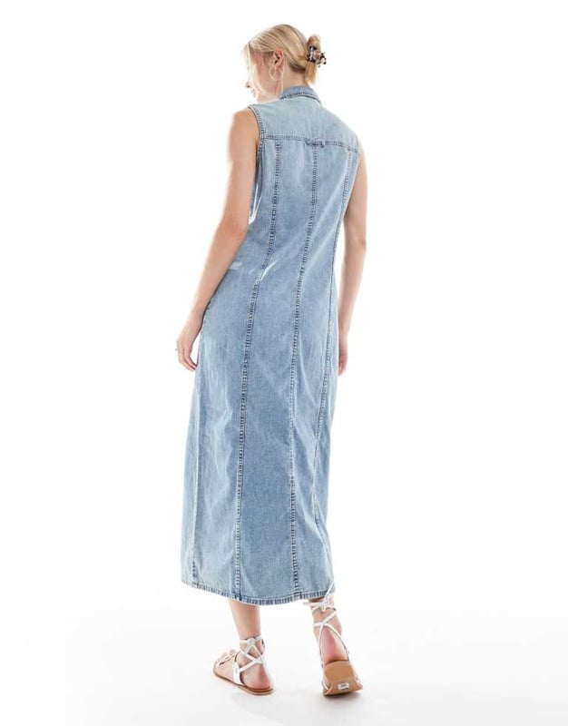 Dresses by Vero Moda Tall For brunch and beyond Spread collar Button-through front Sleeveless style Chest pockets Regular fitSold By: Asos