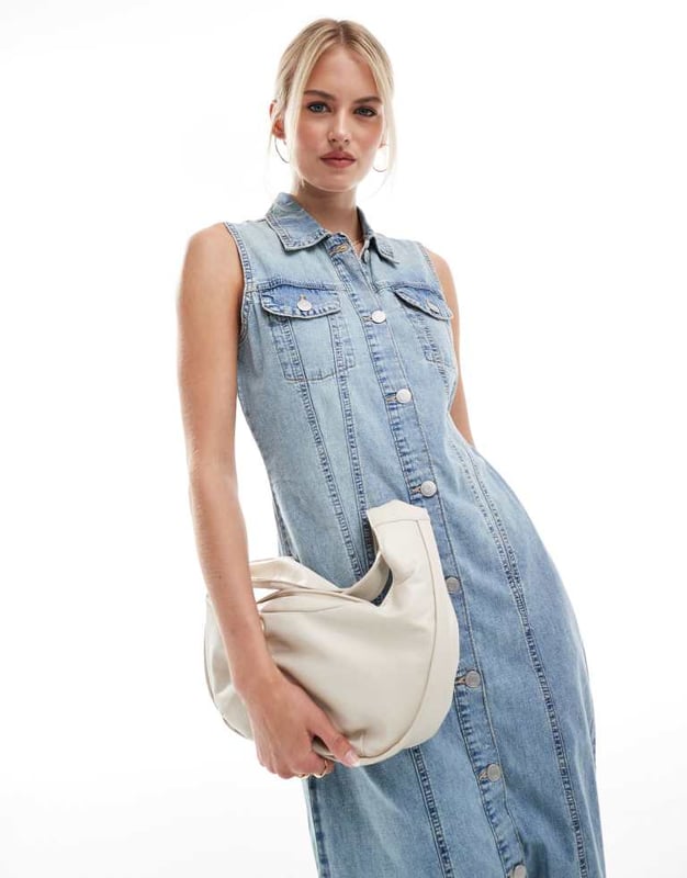 Dresses by Vero Moda Tall For brunch and beyond Spread collar Button-through front Sleeveless style Chest pockets Regular fitSold By: Asos