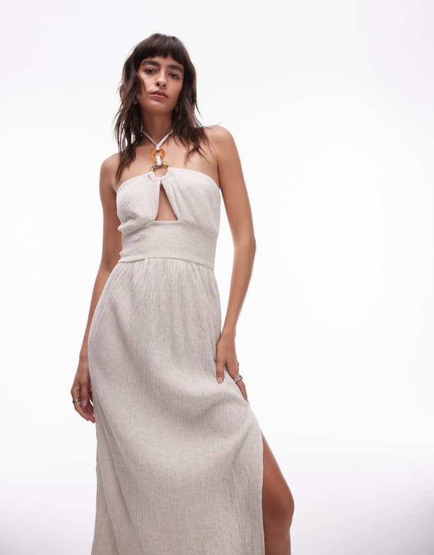Dresses by Topshop This is Topshop Halterneck style Ring details Cut-out front Thigh-high split Regular fitSold By: Asos
