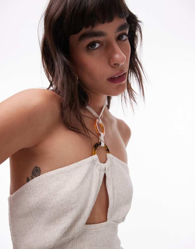 Dresses by Topshop This is Topshop Halterneck style Ring details Cut-out front Thigh-high split Regular fitSold By: Asos