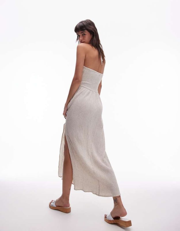Dresses by Topshop This is Topshop Halterneck style Ring details Cut-out front Thigh-high split Regular fitSold By: Asos