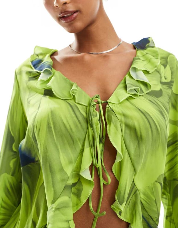 Tops by Y.A.S Part of a co-ord set Skirt sold separately V-neck Tie front Long sleeves Ruffle trims Open front Regular fitSold By: Asos