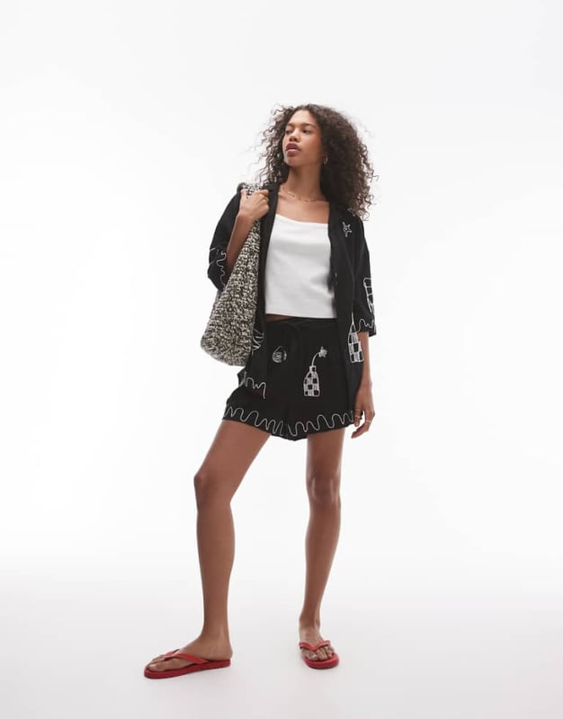 Trousers & Leggings by Topshop This is Topshop Part of a co-ord set Embroidered details Mid rise Elasticated drawstring waist Regular fitSold By: Asos