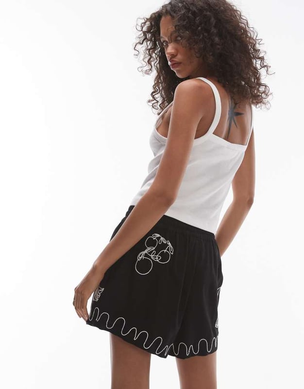Trousers & Leggings by Topshop This is Topshop Part of a co-ord set Embroidered details Mid rise Elasticated drawstring waist Regular fitSold By: Asos