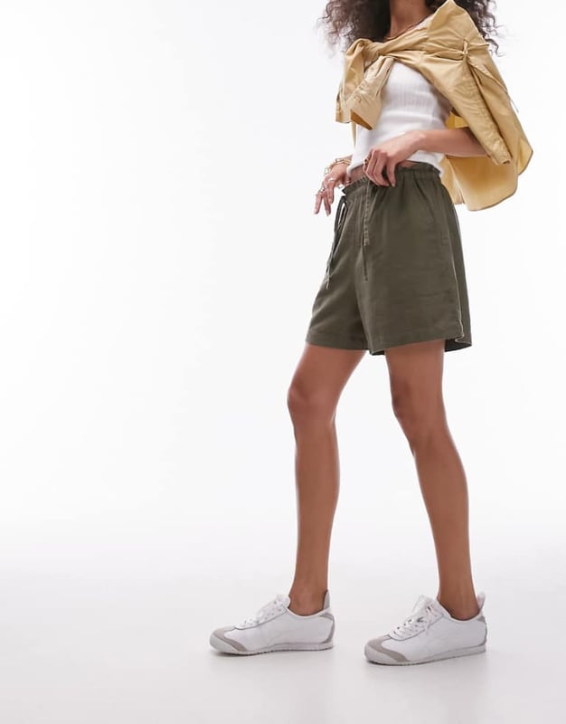 Trousers & Leggings by Topshop Welcome to the next phase of Topshop High rise Elasticated tie waist Side pockets Regular fitSold By: Asos