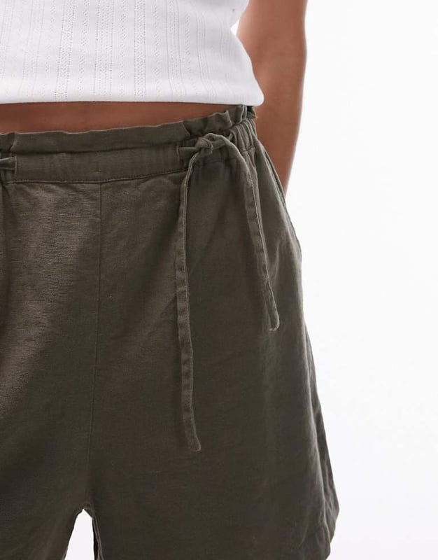 Trousers & Leggings by Topshop Welcome to the next phase of Topshop High rise Elasticated tie waist Side pockets Regular fitSold By: Asos