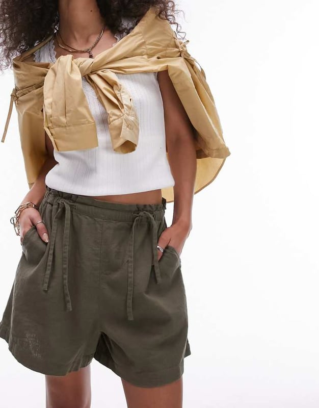 Trousers & Leggings by Topshop Welcome to the next phase of Topshop High rise Elasticated tie waist Side pockets Regular fitSold By: Asos