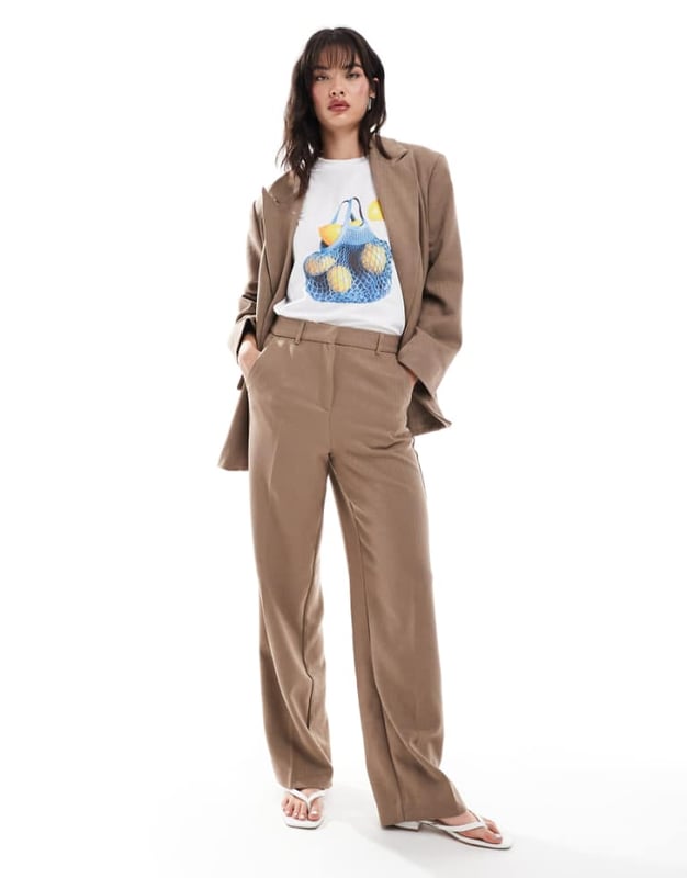 Trousers & Leggings by Vero Moda Part of a co-ord set Blazer sold separately Herringbone design Mid rise Belt loops Concealed fly Pockets to side and reverse Wide legSold By: Asos