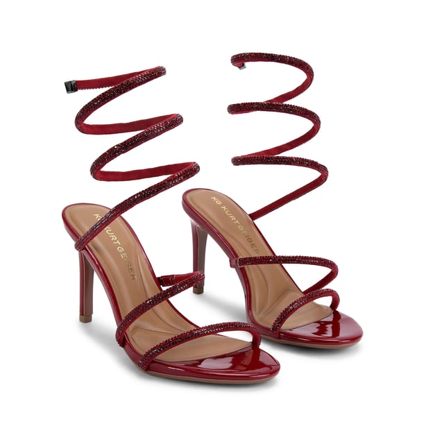 This KG Kurt Geiger Athena heel is crafted in a patent red leather alternative with red crystal embellished spiral ankle strap. The heel is in a high stiletto style. Heel height: 9cm.