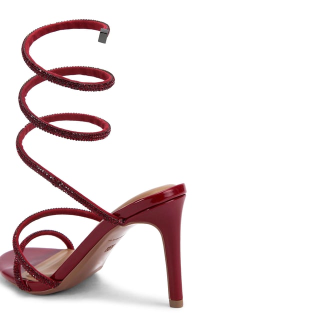 This KG Kurt Geiger Athena heel is crafted in a patent red leather alternative with red crystal embellished spiral ankle strap. The heel is in a high stiletto style. Heel height: 9cm.