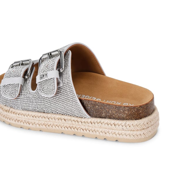 This KG Kurt Geiger Raquel Gem is a slip-on sandal with silver crystal embellishment across both of the straps. The straps are fastened with silver buckles and the sole is in a rope style.