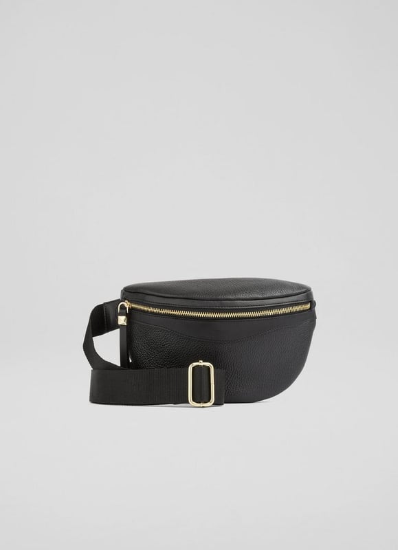 Picture yourself strolling through a sunlit piazza with the Rosie by your side. This black shoulder bag is crafted from grained leather, featuring new branding and a cotton lining, making it a timeless Italian piece. Ideal for brunch dates or weekend getaways, it pairs with anything from tailored suits to casual daywear ensembles.