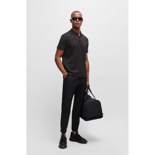 Heren BOSS Paddy Hexaquilt Relaxed Fit Poloshirt in Quilted Gemerceriseerd Katoen in zwartEen luxueus zacht poloshirt gemaakt van gemerceriseerd katoen. Dit relaxed-fit poloshirt van BOSS Menswear is afgewerkt met een platte gebreide kraag en manchetten. Een ton-sur-ton logo zorgt voor een geraffineerde afwerking.- Relaxed fit- Platgebreide kraag- Aantal knopen: 3- Korte mouwen- Platgebreide manchetten- Standaardlengte- 100% Katoen.  Machinewasbaar.- Ref: 50533239-001