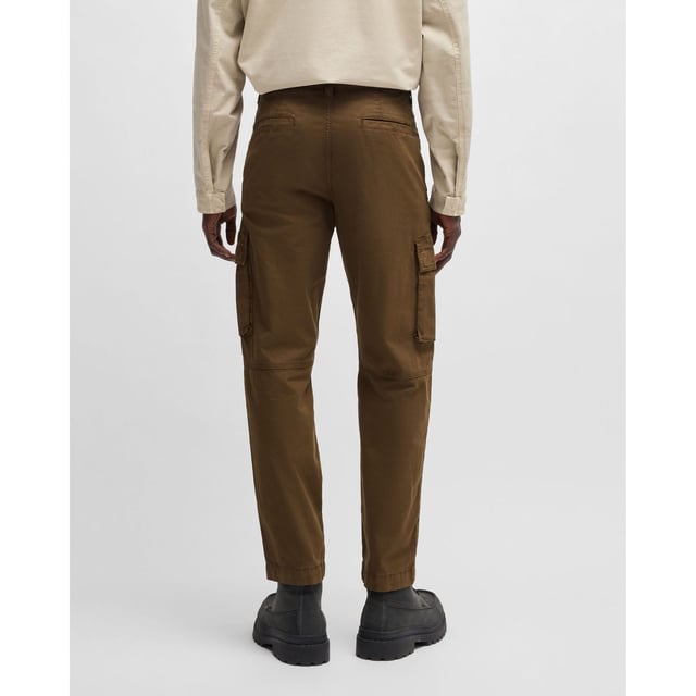 Mens BOSS Sisla-8 Cargo Trousers in Stretch-Cotton Twill in open green.Casual cargo trousers by BOSS Menswear. Featuring a logo patch on the pocket  this comfy pair is crafted in breathable stretch twill. This product’s raw material is derived from regenerative agriculture: an approach focused on preservation and restoration that aims to increase biodiversity  preserve water quality and improve soil health while absorbing CO2. Regenerative agriculture also promotes animal welfare and fair working conditions for farmers.- Regular fit- Regular rise- Button and zip closure- Fit foot width: 38cm- 98% Cotton  2% Elastane  pocketing: 65% Polyester  35% Cotton.  Machine washable.- Ref: 50530599-368
