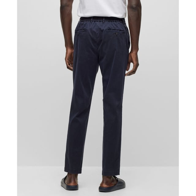 Mens BOSS C-Genius-D-RDS-234F Slim Fit Stretch Trousers with Drawstring Waist in dark blueSlim fit trousers made from stretch fabric with drawstring waistband.- Slim fit- Mid rise- Hook and zip closure- Elasticated waist with drawstring- Front slant pockets- Rear buttoned welt pockets- 64% Lyocell  34% Cotton  2% Elastane.  Machine washable.- Ref: 50501880-404