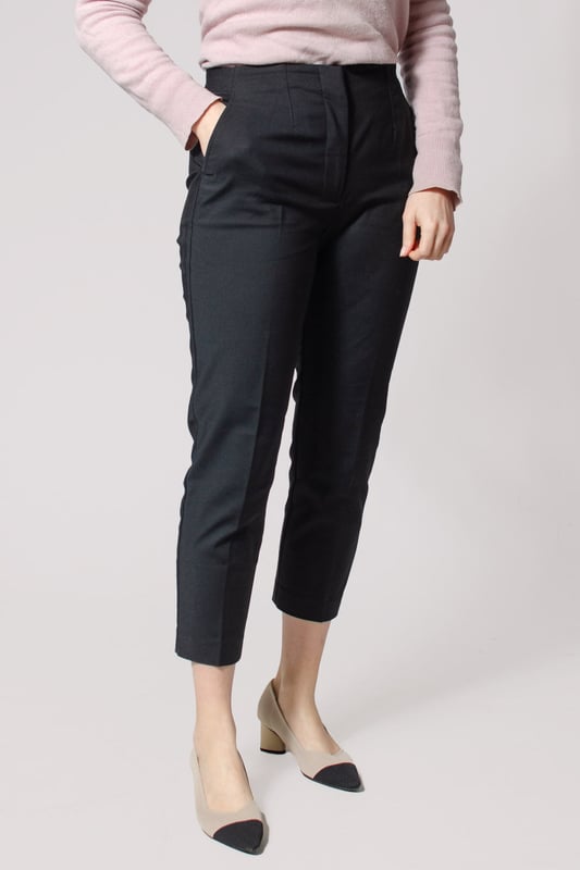 These trousers offer easy wear for smart and casual occasions alike. They have tapered legs with added stretch for comfort and an ankle-grazer length for a contemporary look. The elasticated high waist features double darts for a tailored effect and fastens securely with a hook bar and zip with a concealed button.