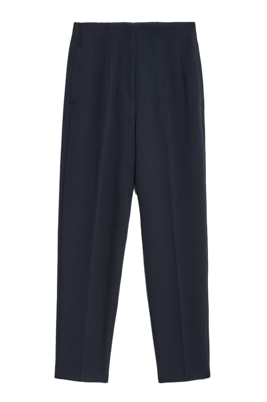 These trousers offer easy wear for smart and casual occasions alike. They have tapered legs with added stretch for comfort and an ankle-grazer length for a contemporary look. The elasticated high waist features double darts for a tailored effect and fastens securely with a hook bar and zip with a concealed button.