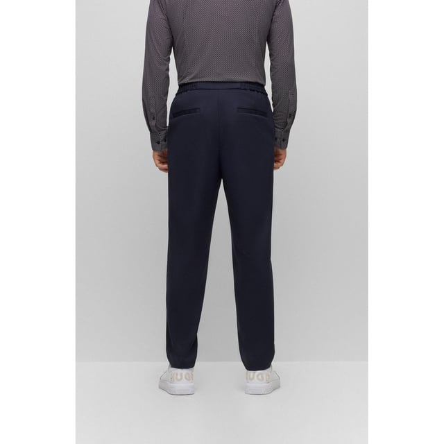 Mens HUGO Gos233F1J Trousers in dark blue- Elasticised waistband- Button and zip closure- Side pockets- Rear welt pockets- HUGO Performance- 53% Polyester  41% Cotton  6% Elastane.  Dry clean.- Ref: 50497191-405