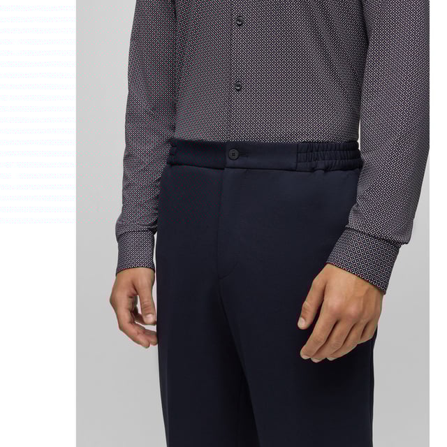 Mens HUGO Gos233F1J Trousers in dark blue- Elasticised waistband- Button and zip closure- Side pockets- Rear welt pockets- HUGO Performance- 53% Polyester  41% Cotton  6% Elastane.  Dry clean.- Ref: 50497191-405