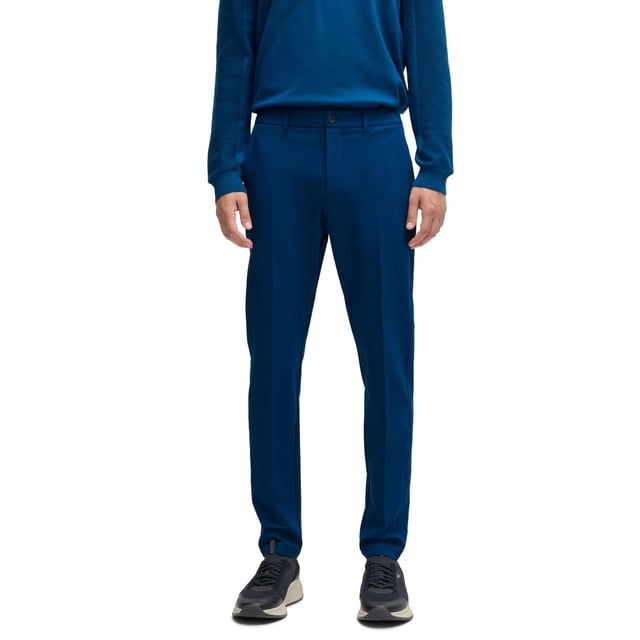 Mens BOSS T Commuter Slim-Fit Chinos in easy-iron four-way stretch fabric in open blueTimeless slim-fit chinos by BOSS Menswear  crafted from easy-iron four-way stretch fabric for optimum comfort. Designed with a quick-dry  water-repellent finish. Featuring a customisable waistband with drawstrings that can be worn inside or out  along with an integrated card-holder and coin-catcher pocket for wallet-free commuting.-Slim fit- Regular rise- Button and zip closure- Tapered leg- Pockets bottom back: Patch pocket- Fit foot width: 33cm- 92% Polyester  8% Elastane  pocketing: 100% Polyester.  Machine washable- Ref: 50495497-494