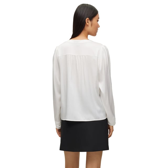 Womens BOSS Biralana Blouse in open white.- Tunic neckline- Concealed button placket- Long sleeves with knot detail cuffs- Relaxed fit- 90% Silk  10% Elastane.  Dry clean.- 50501001-112