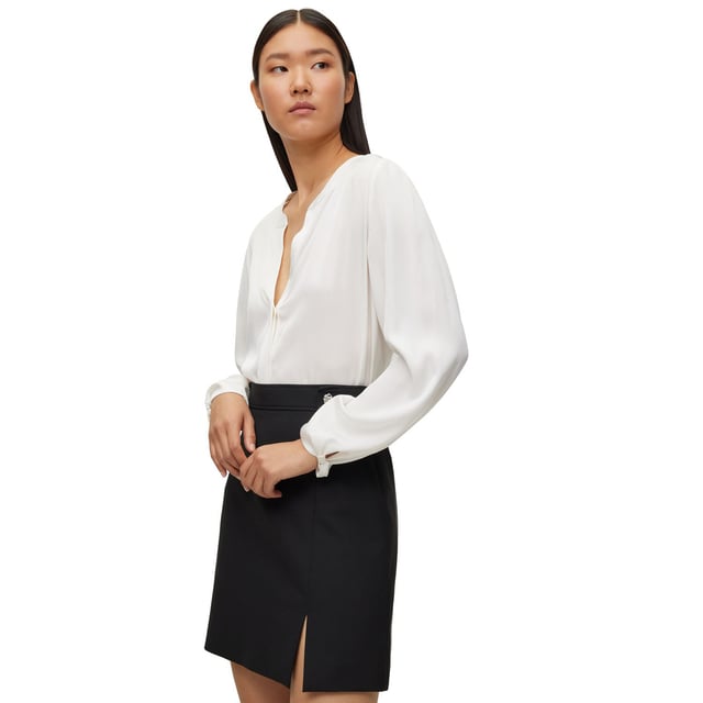Womens BOSS Biralana Blouse in open white.- Tunic neckline- Concealed button placket- Long sleeves with knot detail cuffs- Relaxed fit- 90% Silk  10% Elastane.  Dry clean.- 50501001-112