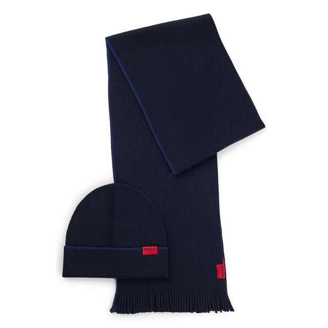 Mens HUGO Zaschel Logo Label Hat and Scarf Set with Wool in navyA minimalist accessory set  blended with virgin wool  by HUGO. The hat and scarf are each detailed with contrast stripes and red logo labels.- Scarf approx. dimensions: Length 172cm x Width 23cm- 50% Virgin wool  50% Polyacrylic.  Hand wash - Dry clean.- Ref: 50517757-410
