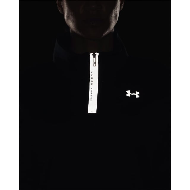 Womens Under Armour Reflective Quarter Zip Top in black.- Stand-up collar.- Long sleeves with ribbed cuffs.- Quarter zip fastening.- 4-way stretch construction moves better in every direction- Ref: 1371627-001