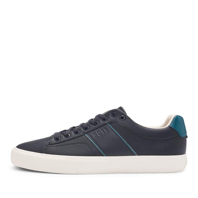 Men's Boss Aiden Tennis Trainers in Blue Mens BOSS Aiden Faux-Leather Trainers with plain and grained textures in open blue.Sporty trainers with piping and debossed branding by BOSS. This pair is crafted in synthetic coated fabric with grained and plain finishes. Synthetic coated fabric sometimes referred to as faux leather is a fabric designed to resemble real leather and-or display a matte glossy smooth or textured coated appearance. - Laces- Fully lined- Packaging: Box- Upper material: 60% Polyurethane 40% Polyester. Lining: 100% Polyester 85% Polyester 15% Polyurethane. Sole: 100% Rubber. Innersole: 100% Polyester.- Ref: 50522833-464