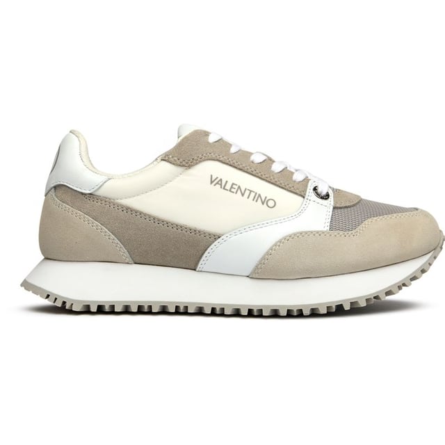 These pristine white suede trainers from Valentino blur the line between athletic performance and luxury fashion. The Italian craftsmanship shines through in every detail, from the plush suede upper to the supportive EVA sole that delivers all-day comfort. Complete with signature Valentino branding and presented in a branded shoe bag, the Dred trainers bring sophisticated sportswear sensibilities to your everyday wardrobe.