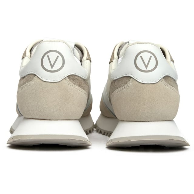 These pristine white suede trainers from Valentino blur the line between athletic performance and luxury fashion. The Italian craftsmanship shines through in every detail, from the plush suede upper to the supportive EVA sole that delivers all-day comfort. Complete with signature Valentino branding and presented in a branded shoe bag, the Dred trainers bring sophisticated sportswear sensibilities to your everyday wardrobe.