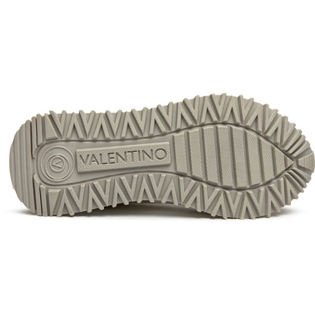 These pristine white suede trainers from Valentino blur the line between athletic performance and luxury fashion. The Italian craftsmanship shines through in every detail, from the plush suede upper to the supportive EVA sole that delivers all-day comfort. Complete with signature Valentino branding and presented in a branded shoe bag, the Dred trainers bring sophisticated sportswear sensibilities to your everyday wardrobe.