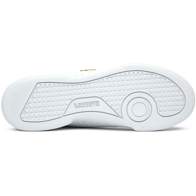 Lacoste Carnaby Cup Trainers The Lacoste Carnaby Cup delivers timeless court style with a modern twist. Crafted from quality leather, these women's white trainers showcase elegant metallic accents that catch the light with each step. The robust rubber cup sole provides excellent stability, while signature Lacoste branding adorns the tongue, heel, and quarter - subtle reminders of the heritage behind these sophisticated sneakers. Perfect for casual outings or dressing up your weekend attire.