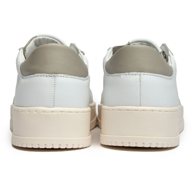 These pristine white leather trainers from Valentino blend Italian craftsmanship with contemporary court-inspired design. The Saturn silhouette features distinctive side stitch sole detailing and subtle Valentino branding for understated luxury. Crafted from premium leather with durable rubber soles, they arrive with a branded shoe bag to preserve their immaculate finish. Perfect for elevating casual looks with refined elegance.