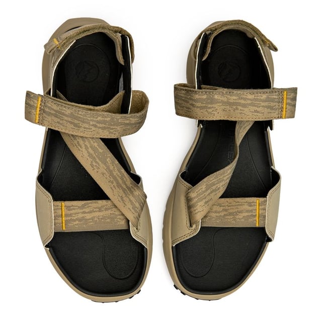Built for adventure seekers who refuse to slow down, the Timberland Motion Dune delivers rugged comfort in a sleek taupe colorway. The contoured footbed cradles your feet through long hikes or beach days, while the cleated rubber sole grips confidently on any terrain. Durable textile straps secure your stride, making these sport sandals your go-to for every outdoor pursuit.