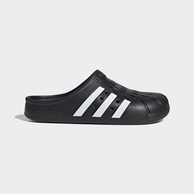 Adilette Clogs Based on the iconic adidas slide, these clogs are as functional as they are comfortable. Whether you're walking to the gym or pool for an early-morning workout or just want to keep the slouchy-casual vibe going all through your day, slip your feet into the contoured footbeds and head for the door. - Regular fit - Slip-on construction - Synthetic upper - Soft feel - Sport-inspired clogs for every day - Contoured EVA footbed - Synthetic outsole Shipped by adidas
