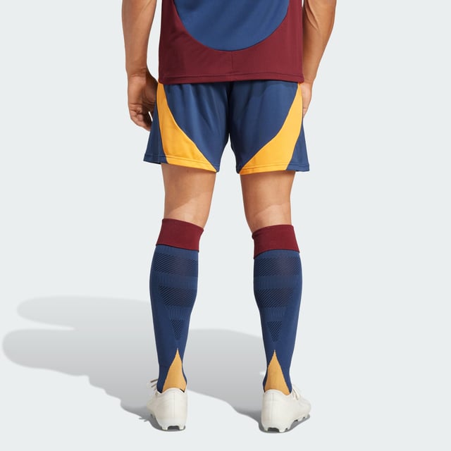 Classic AS Roma with a modern twist. These adidas third kit shorts borrow colours from iconic club kits before applying a contemporary finish for a football look that fits in everywhere. A 1930s-era badge is the star of the show. But it's the 21st-century AEROREADY tech working in the background that makes them feel as good as they look.This product is made with 100% recycled materials. By reusing materials that have already been created, adidas help to reduce waste and our reliance on finite resources and reduce the footprint of the products adidas make.  - Regular fit - Drawcord on elastic waist - 100% polyester (recycled) - AEROREADY - AS Roma woven crest  Shipped by adidas